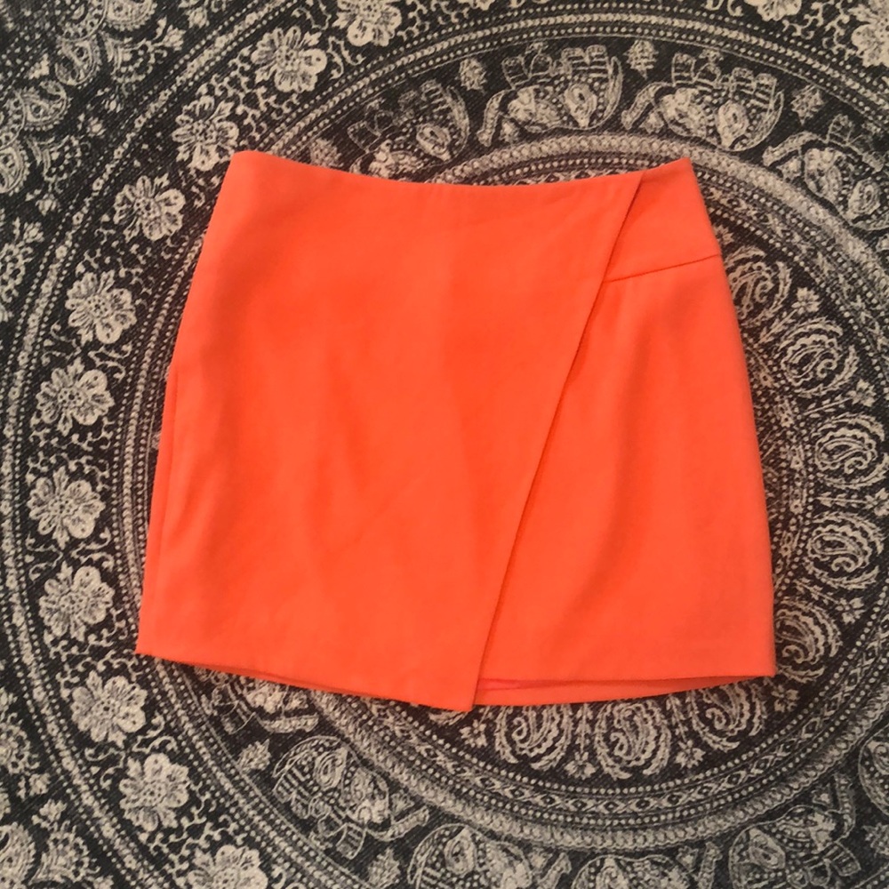 Coral/Salmon Mini skirt with unique wrap-like detail - Bebe